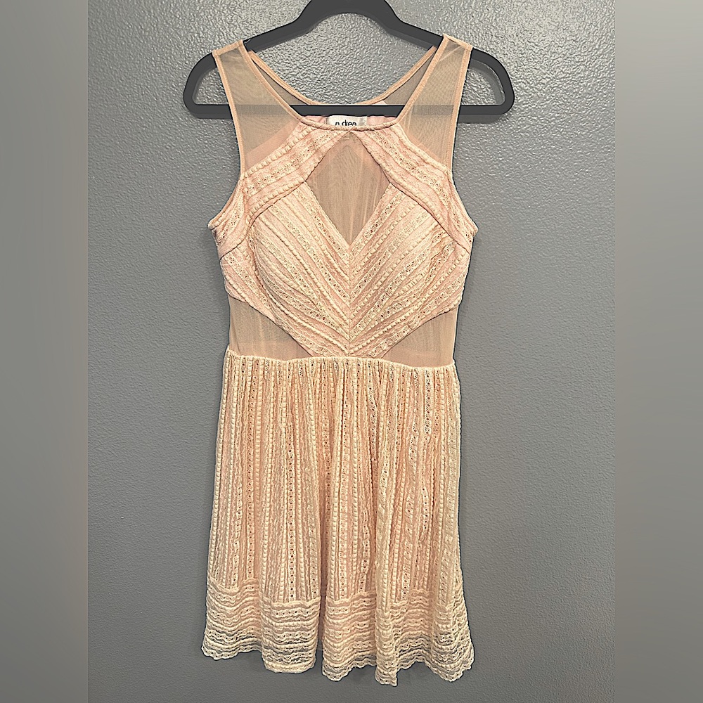 Soft Pink Sleeveless Dress with Mesh Cutouts